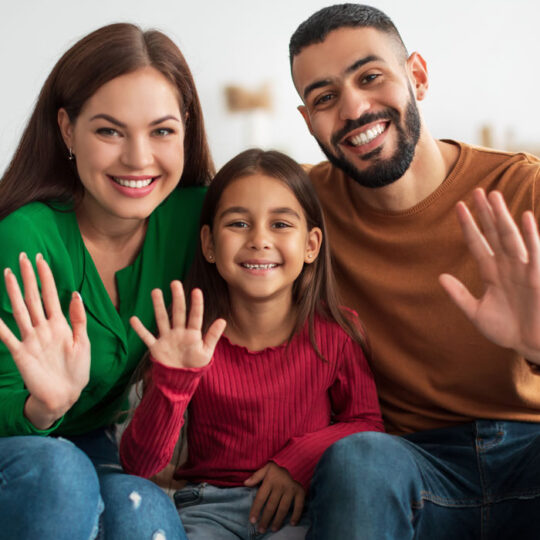 Family smiling confidently after gentle dental care in Waterdown Ontario