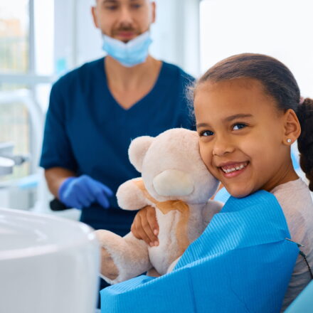 happy black girl at dentist s office looking at ca 2026 01 07 02 28 36 utc 1