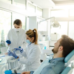 the-female-dentist-and-the-assistant-prepare-the-i-2021-09-03-03-13-09-utc-min